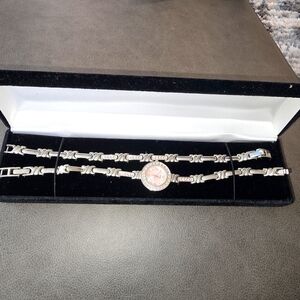 Elegant Silver Watch with Pink Dial